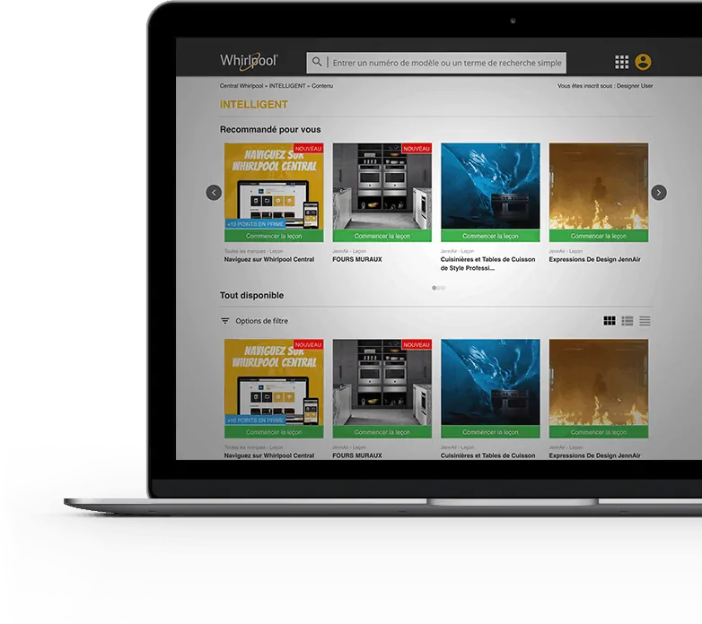 Un ordinateur portable avec le site de Whirlpool affiché à l'écran.