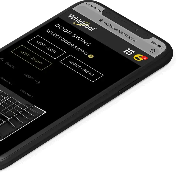 A smart phone with the Whirlpool website displayed on the screen.
