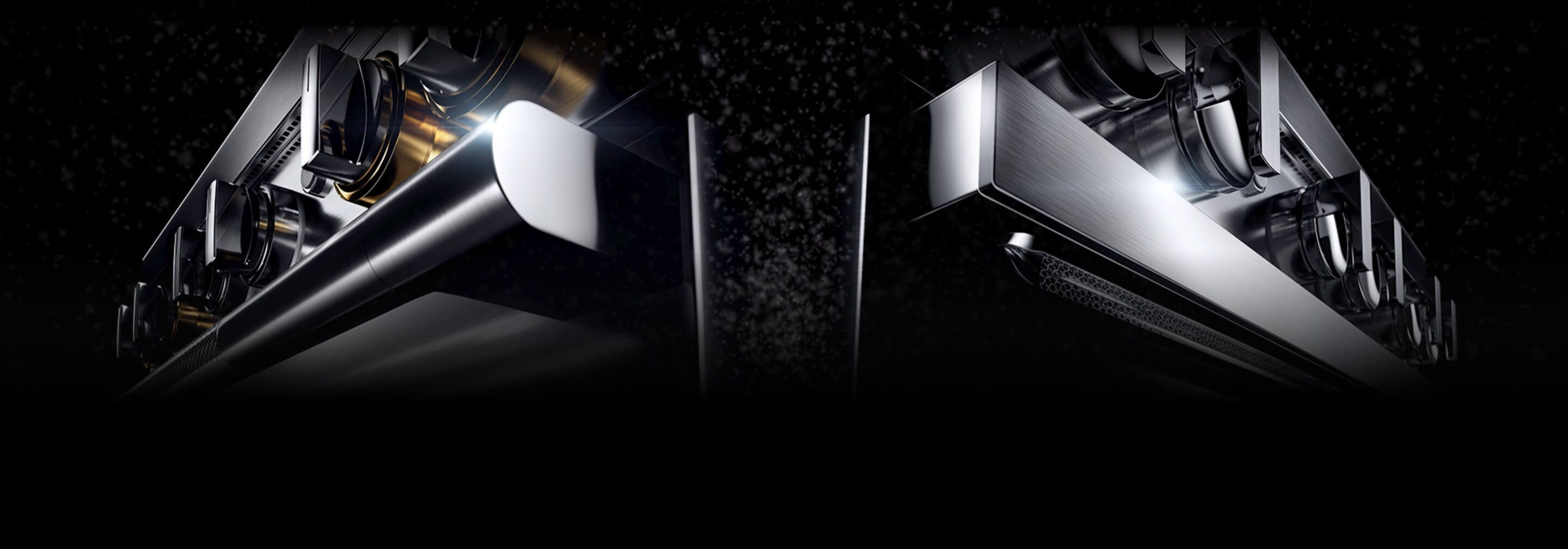 The handles and knobs of RISE™ and NOIR™ design Professional-Style Ranges side by side.