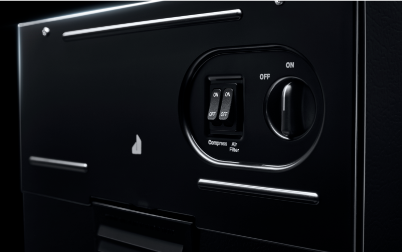 Boutons du panneau de commande d’un compacteur à déchets JennAir