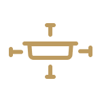 An icon of cookware with t-shaped symbols on each side, indicating to position dishes effectively