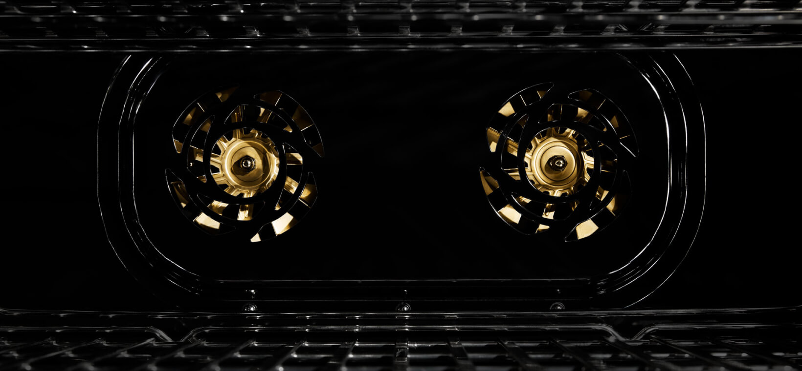 Two fans located inside an oven