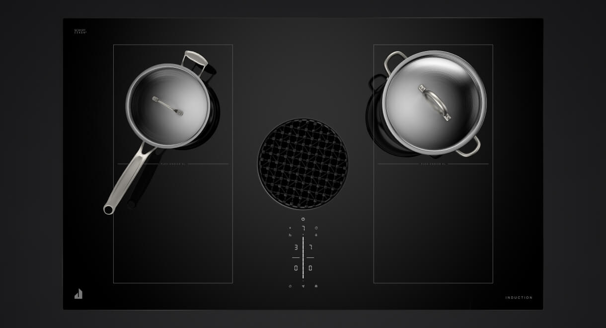 Deux casseroles en acier inoxydable sur une table de cuisson à induction à évacuation descendante.