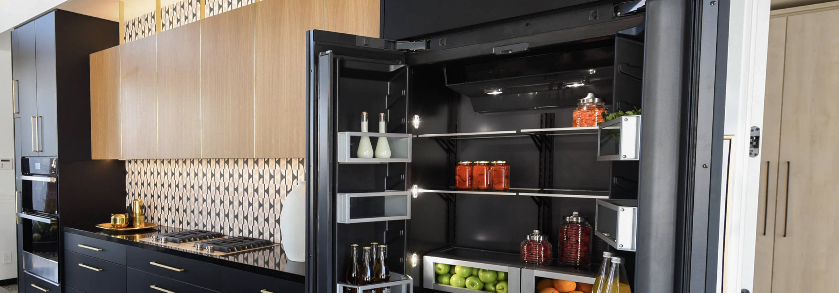 An open JennAir® Built-In Refrigerator.