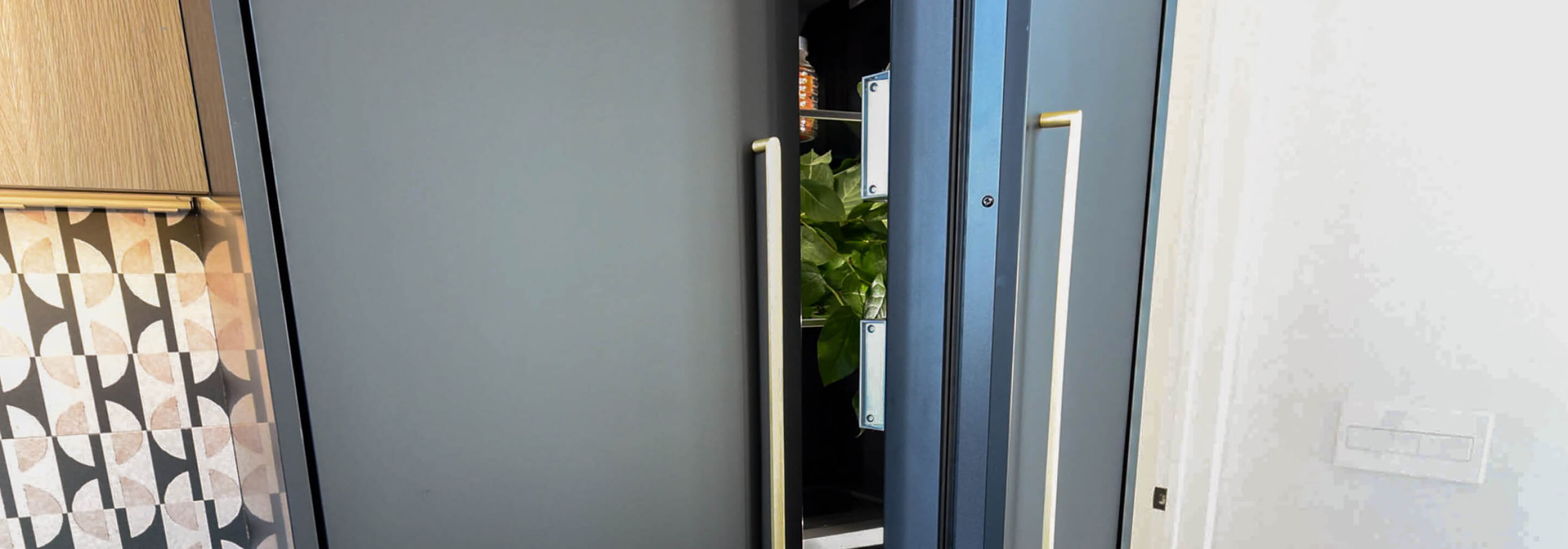 Doors of a French Door Built-In Refrigerator equipped with custom panels.