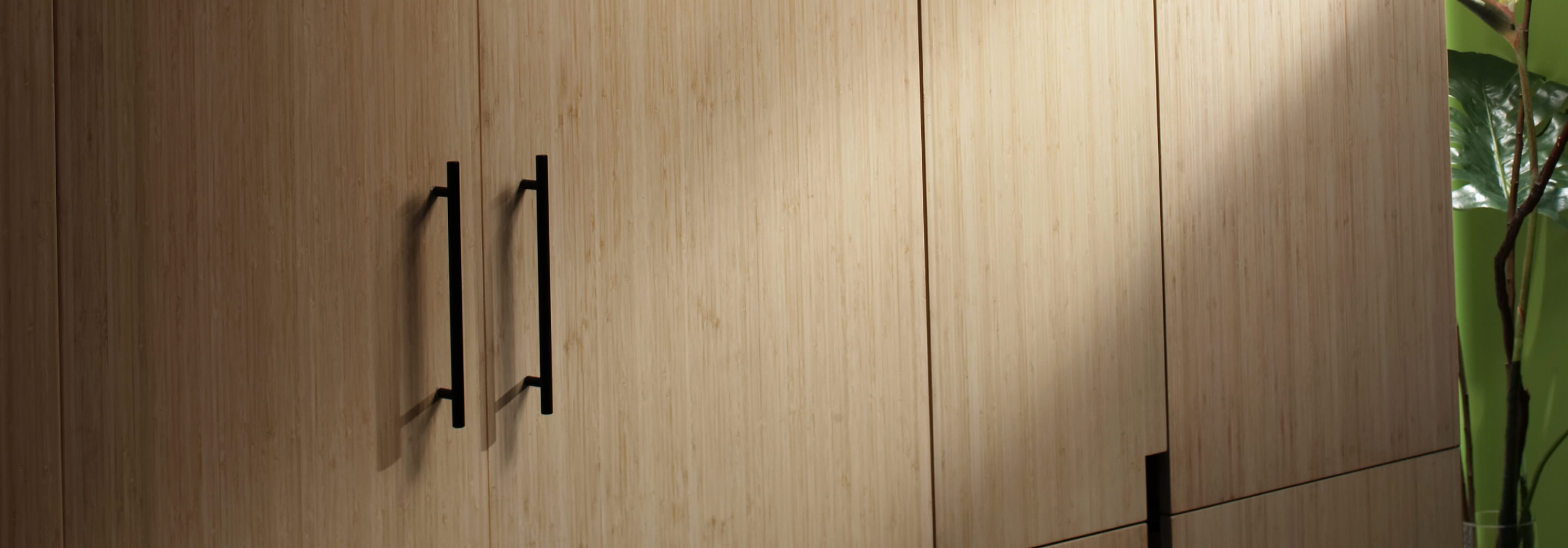 JennAir® Built-In Refrigerators in a side-by-side configuration. The panels are custom wood.