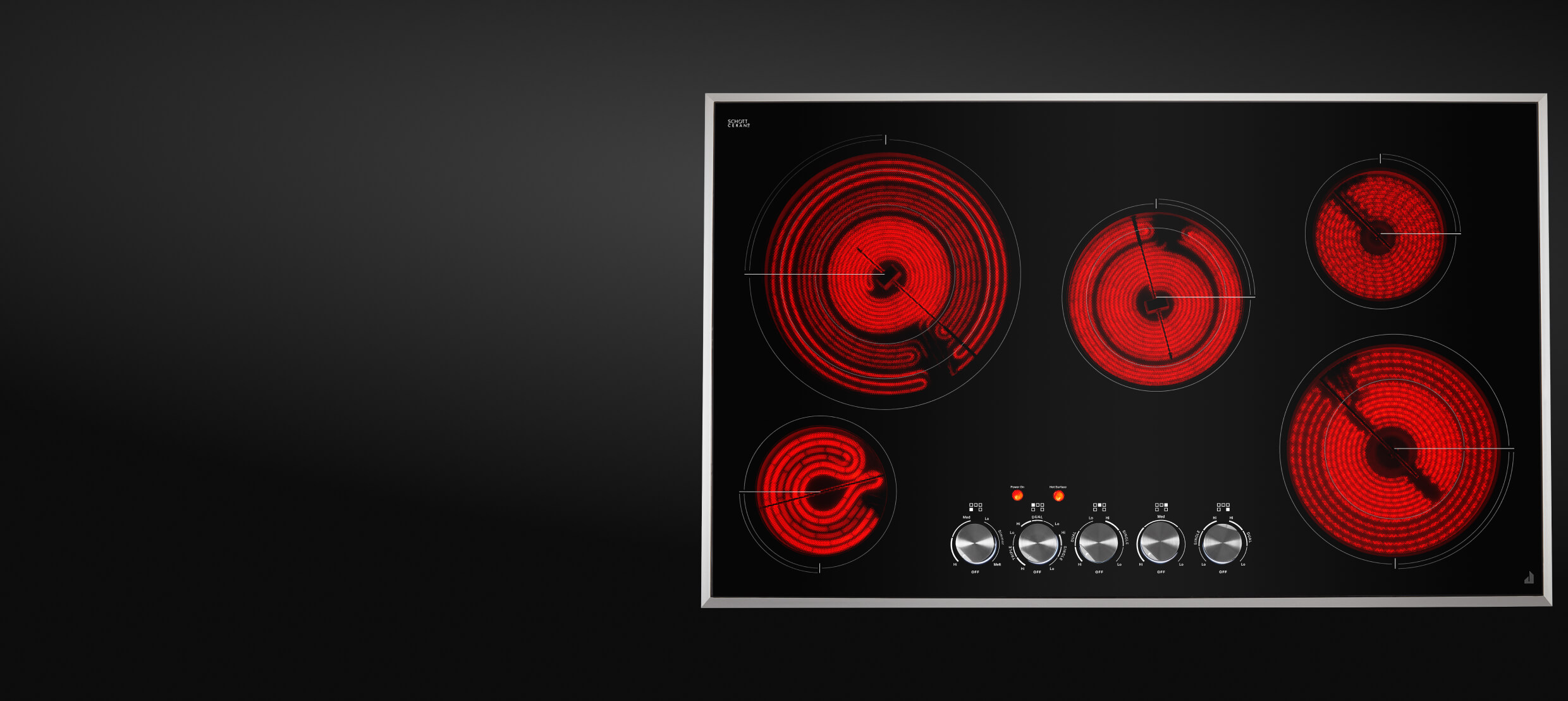 Une vue de dessus d'une table de cuisson électrique radiante avec les éléments chauffants rouges incandescents.