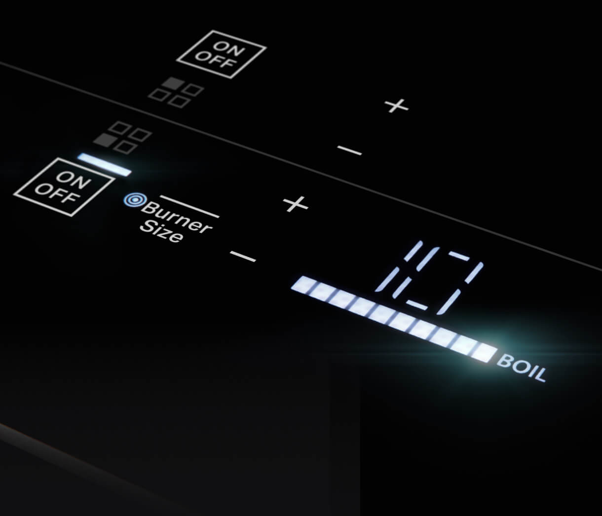 Un gros plan sur les commandes lumineuses interactives d'une table de cuisson.