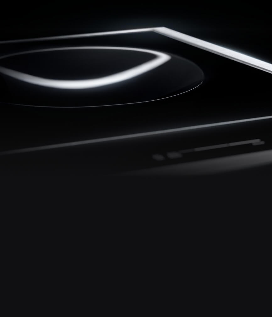 The 15-inch Induction Wok Cooktop with light highlighting the smooth concave wok element.