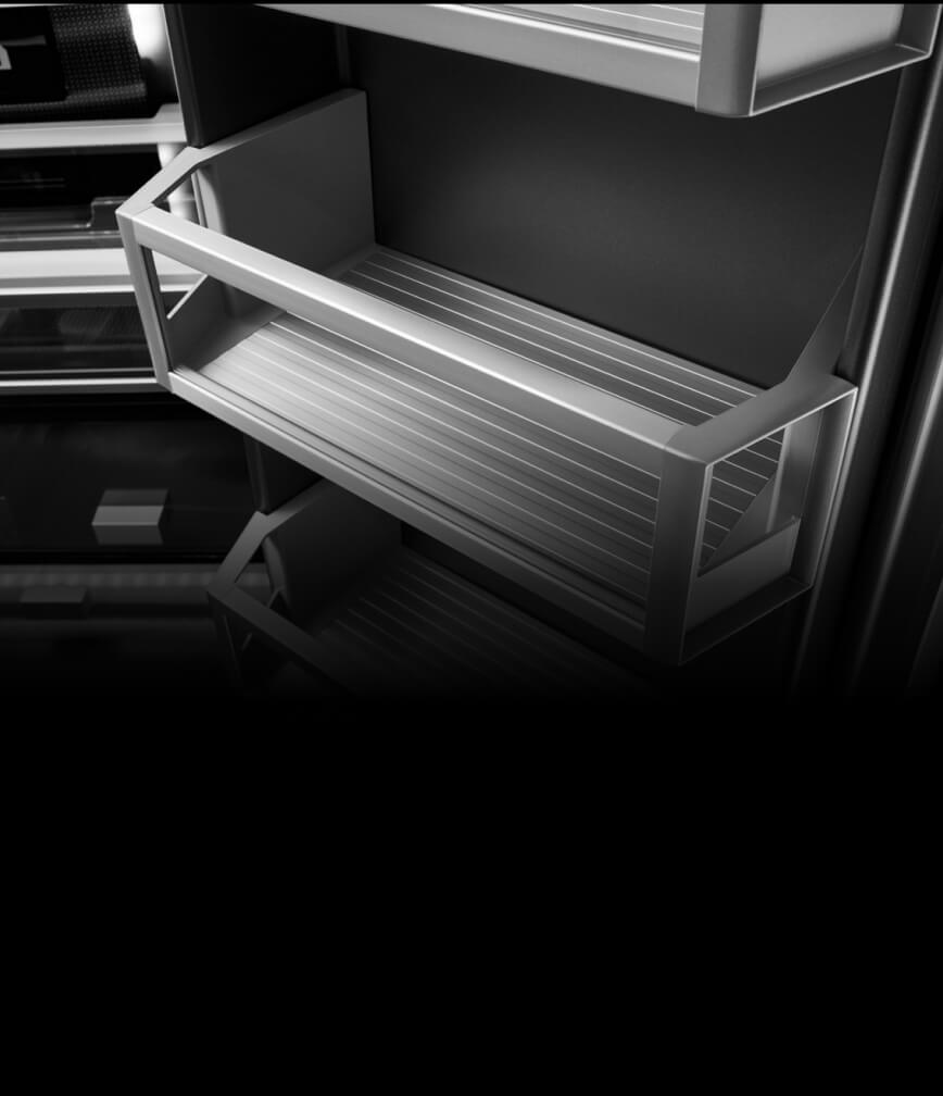 An adjustable refrigerator door bin 