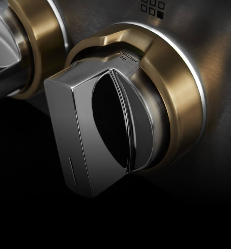 LEDs glowing on the knobs of a RISE™ Design gas rangetop.