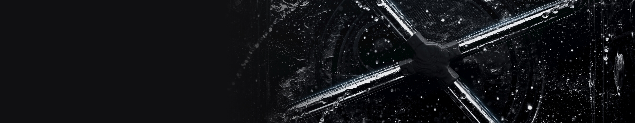 The wash arms inside a JennAir® Dishwasher with water.