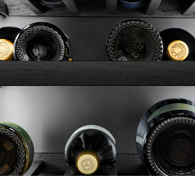 The interior of the wine column, showing bottles.