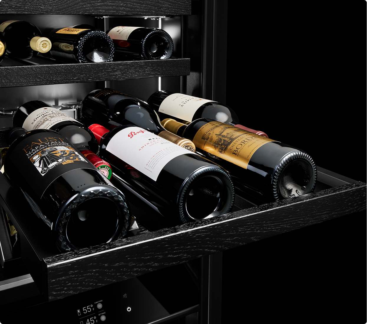 A wine rack pulled out, loaded with six wine bottles. A wine rack pulled out, loaded with six wine bottles.