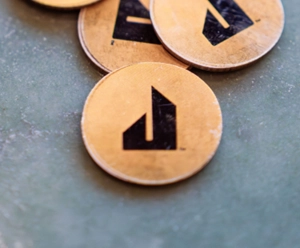  Coasters with the JennAir logo on them