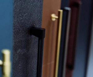 Handles that are part of the JennAir Leather Cuts Collection.