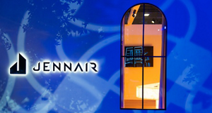  JennAir logo on a blue background with white lines. Through a window is a glimpse of the LLDS stall, JennAir Boutique.