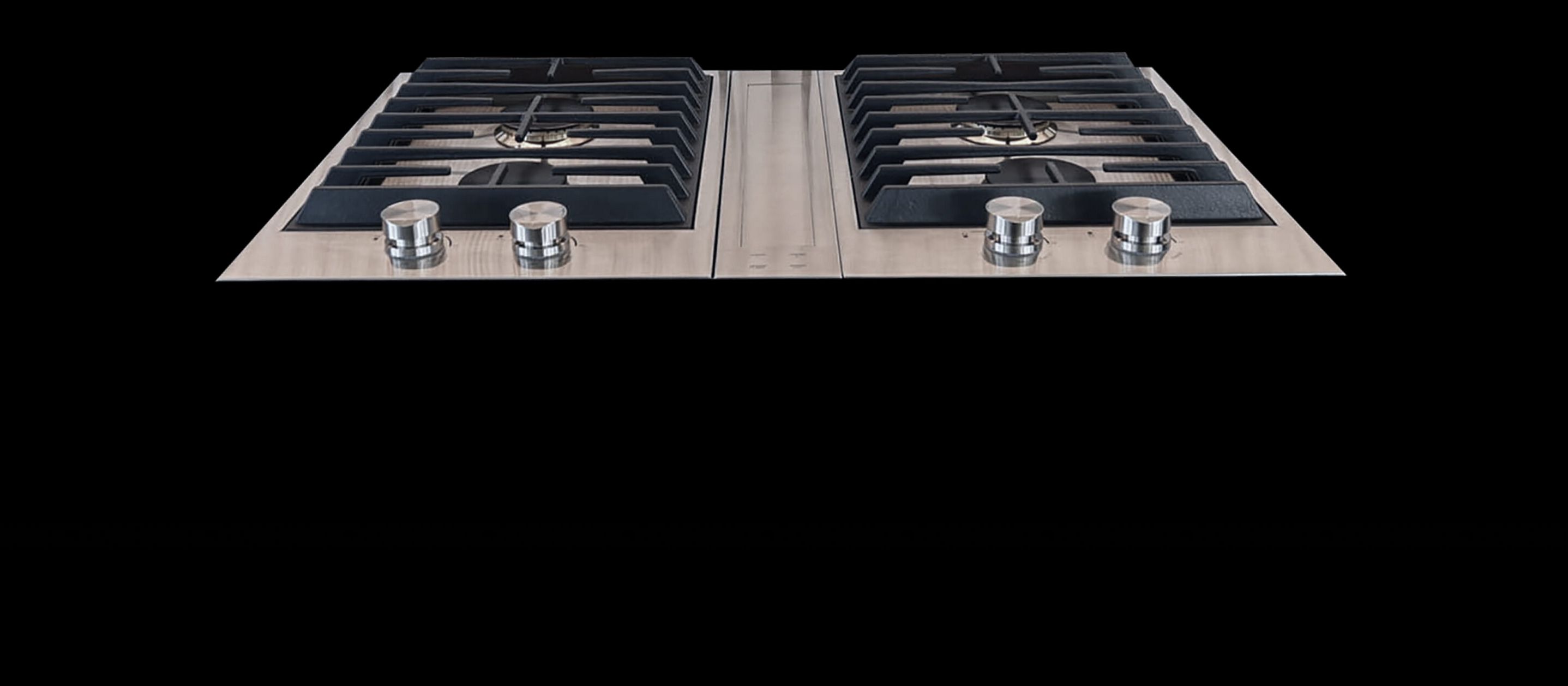 JennAir® 2-burner customized cooktops paired with a downdraft ventilation strip.