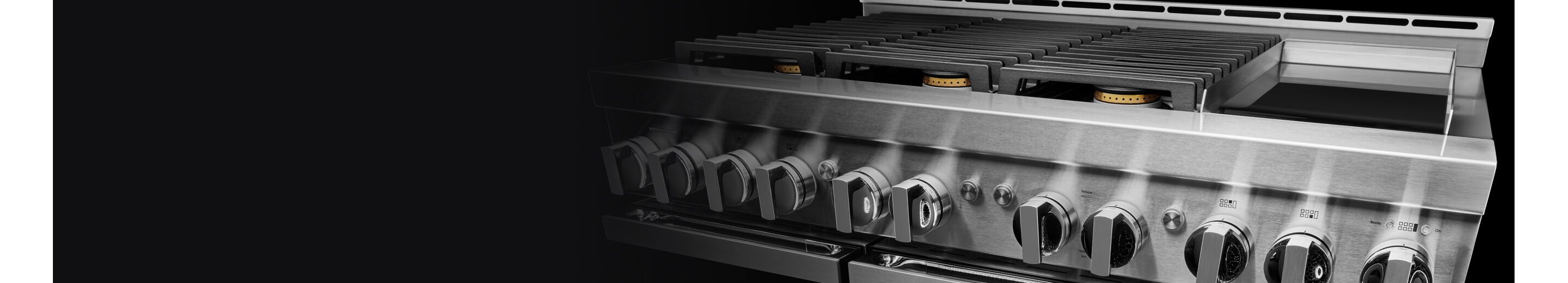 A JennAir® NOIR™ Gas Range with an electric griddle.
