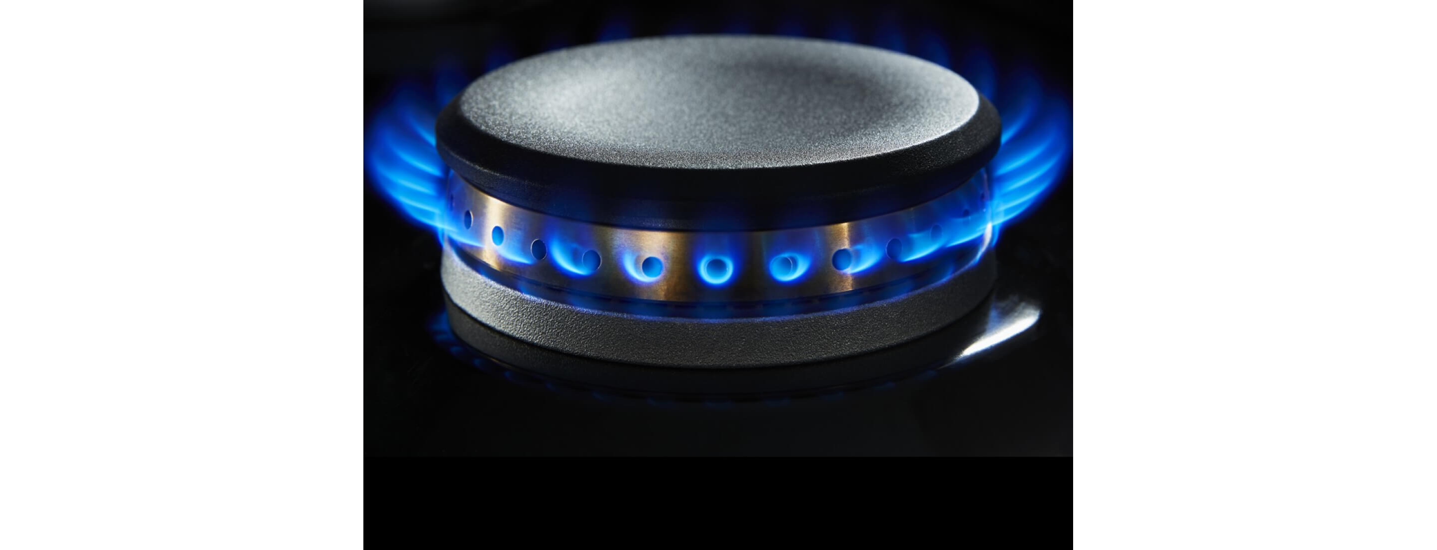 A lit dual-stacked burner.
